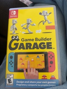 Nintendo Game Builder Garage - Yellow Cover with Blue & Red Joy‑Con Graphics